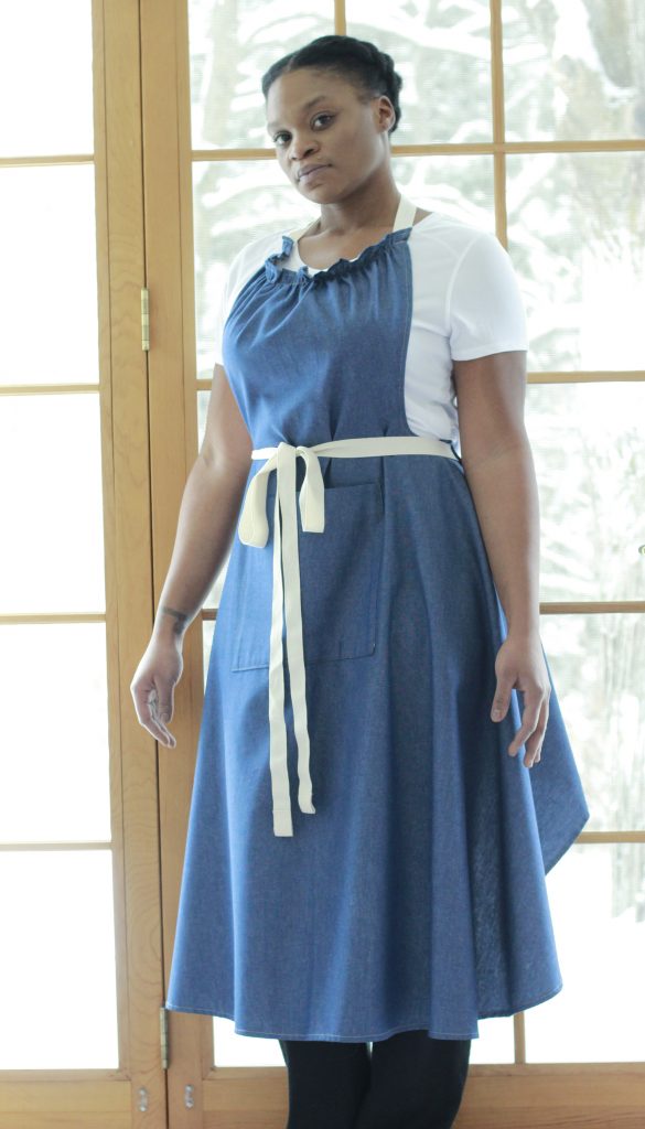 The Vermont Apron Company's new Long Bib Apron in denim. The ruffled top stops the bib from gaping.
