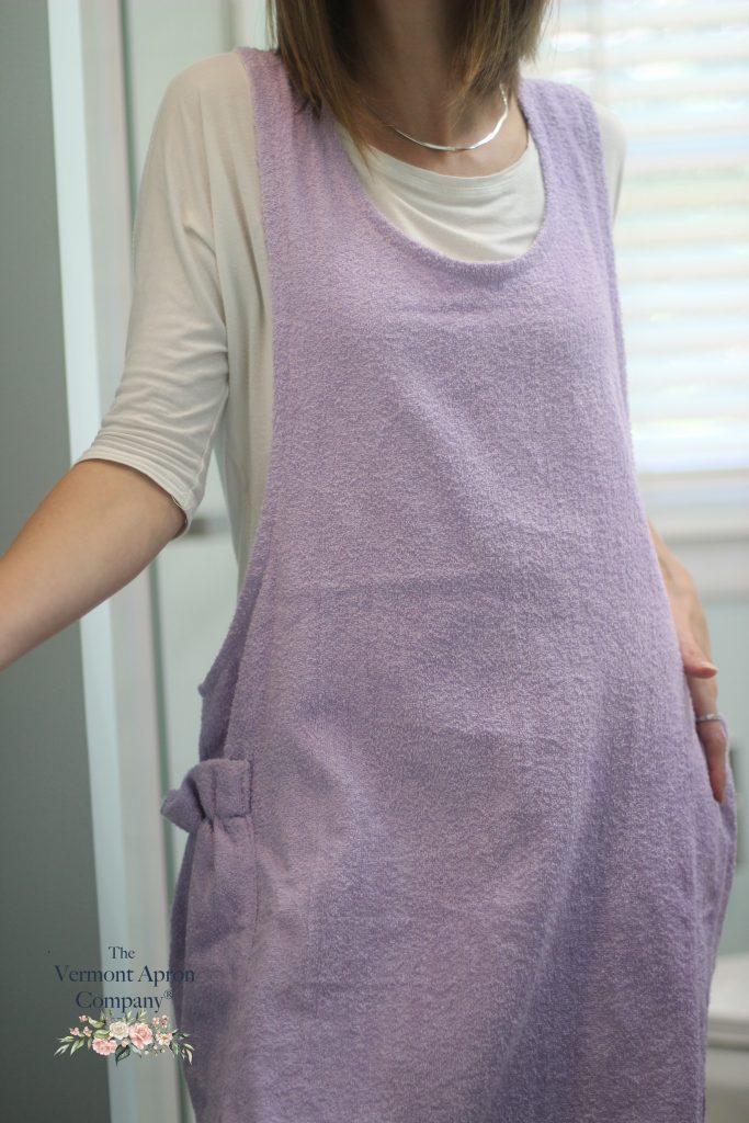 A close up of the terrycloth apron with the texture prominent to the viewer.